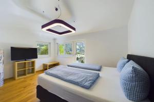 Posteľ alebo postele v izbe v ubytovaní Haus Silvretta NOVA