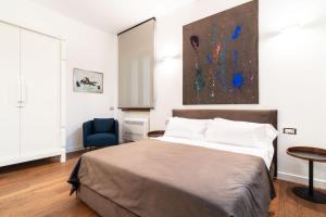 Postel nebo postele na pokoji v ubytování Panoramic Flat-Les Suites