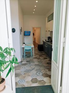 A kitchen or kitchenette at La Maison Della Torre