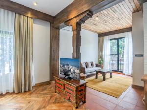 Ein Sitzbereich in der Unterkunft Uma Residence and Suites