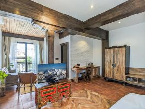 Ein Sitzbereich in der Unterkunft Uma Residence and Suites