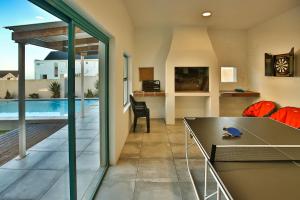 Μια τηλεόραση ή/και κέντρο ψυχαγωγίας στο The Spry House, Langebaan
