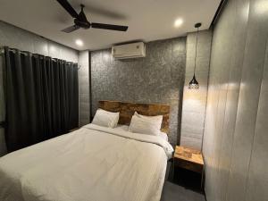Ariv comforts baga客房内的一张或多张床位