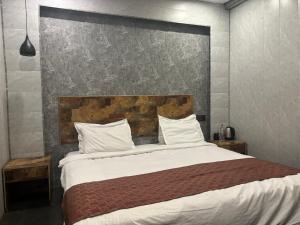 Ariv comforts baga客房内的一张或多张床位