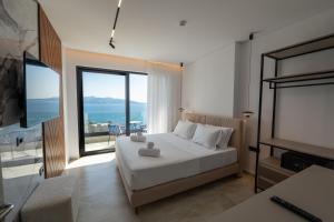 Uma cama ou camas num quarto em Litan Hotel