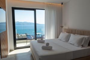Uma cama ou camas num quarto em Litan Hotel