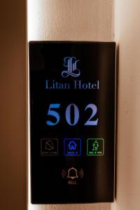 Um certificado, prémio, placa ou documento mostrado em Litan Hotel