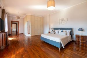 Letto o letti in una camera di Gargiulo Suites