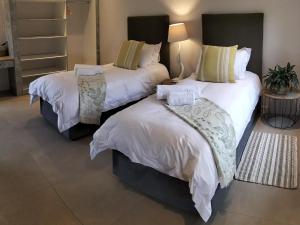 Cama o camas de una habitación en Little Dinokeng Bush Lodge