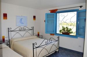Posteľ alebo postele v izbe v ubytovaní Casa Vacanze Diaz