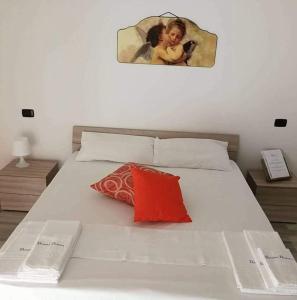 Postel nebo postele na pokoji v ubytování Casa vacanze Dimo Dimira-PUGLIA E SALENTO
