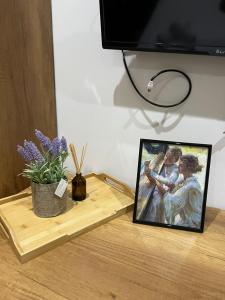 TV a/nebo společenská místnost v ubytování Urban Room 1