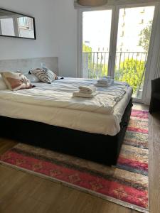 Posteľ alebo postele v izbe v ubytovaní Apartments Bliska Residence