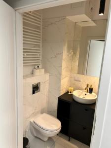 Kúpeľňa v ubytovaní Apartments Bliska Residence + 6 fotografií