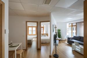 Ένα ή περισσότερα κρεβάτια σε δωμάτιο στο Apartamento Moroy