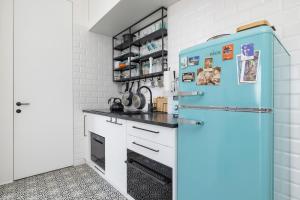 Kuchyňa alebo kuchynka v ubytovaní Kraków Apartament Blisko Centrum Kongresowego i Wawelu by Noclegi Renters