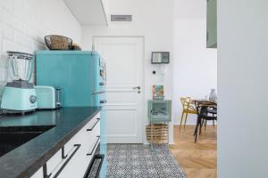 Kuchyňa alebo kuchynka v ubytovaní Kraków Apartament Blisko Centrum Kongresowego i Wawelu by Noclegi Renters