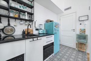 Kuchyňa alebo kuchynka v ubytovaní Kraków Apartament Blisko Centrum Kongresowego i Wawelu by Noclegi Renters