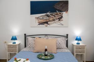 Postel nebo postele na pokoji v ubytování Sunrise Apartment Santorini + 37 fotografií