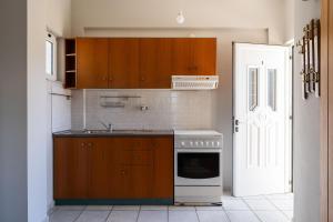 A kitchen or kitchenette at Medousa Studio & Apartments
