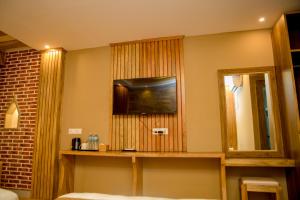 TV a/nebo společenská místnost v ubytování Hotel Matina Suites