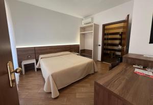 Posteľ alebo postele v izbe v ubytovaní Hotel Soleado