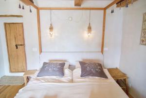 CB-Guesthouse客房内的一张或多张床位