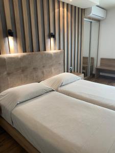 Posteľ alebo postele v izbe v ubytovaní Selefkos Palace