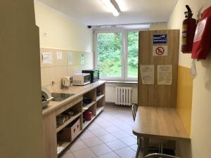 Kuchyň nebo kuchyňský kout v ubytování Dom Studenta Pod Jeleniem + 13 fotografií