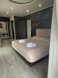 Posteľ alebo postele v izbe v ubytovaní Selefkos Palace
