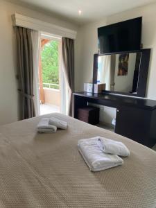 Posteľ alebo postele v izbe v ubytovaní Selefkos Palace