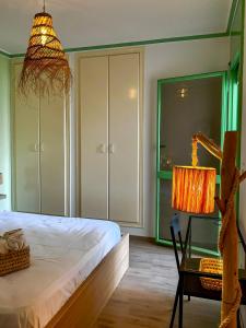 Postel nebo postele na pokoji v ubytování Luxueux appartement avec vue mer & piscine