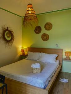 Postel nebo postele na pokoji v ubytování Luxueux appartement avec vue mer & piscine