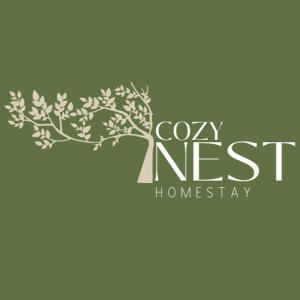 a tree logo with the words cozy ness homeseway at Cozy Nest Homestay I in Guwahati