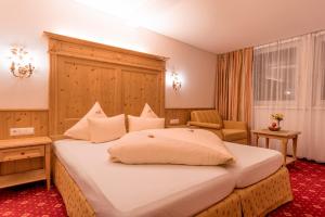 Voodi või voodid majutusasutuse Hotel Bergkristall toas