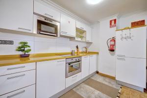 Kuchyňa alebo kuchynka v ubytovaní Casa Ana Mari I by Clabao