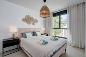 Posteľ alebo postele v izbe v ubytovaní Estepona Place - Spacious family city apartment
