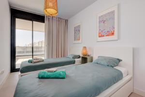 Posteľ alebo postele v izbe v ubytovaní Estepona Place - Spacious family city apartment