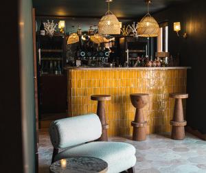 Salone o bar di Boutique Hôtel Responsable et Restaurant Basgi Basgi