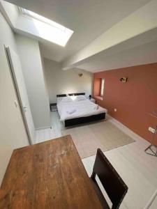 Ένα ή περισσότερα κρεβάτια σε δωμάτιο στο NEW Maison avec Jardin 5 pers +10 φωτογραφίες