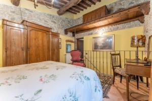 Postel nebo postele na pokoji v ubytování Mulino di Castelvecchio
