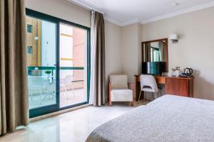 Postel nebo postele na pokoji v ubytování Hotel Torremar - Mares