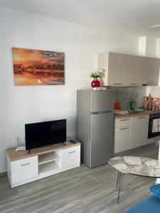 Kuchyň nebo kuchyňský kout v ubytování Beautiful Apartment Amaryllis