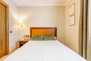Postel nebo postele na pokoji v ubytování Hotel Torremar - Mares