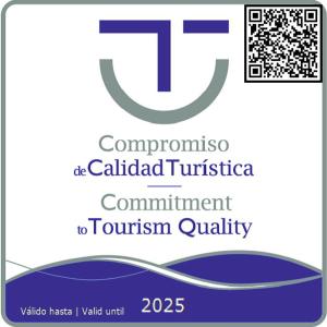 un logo pour un comité appelé comité de la qualité du tourisme dans l'établissement MD Modern Hotel - Jardines, à Valence