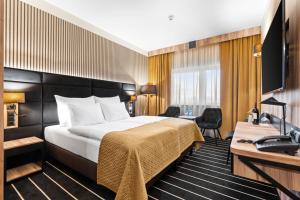 Postel nebo postele na pokoji v ubytování Park Hotel Diament Wroclaw + 36 fotografií