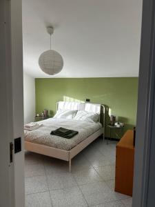 Postel nebo postele na pokoji v ubytování Da Maddalena + 6 fotografií