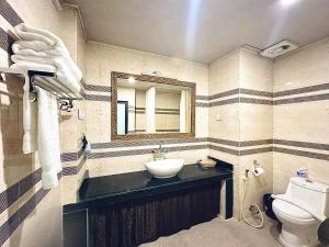Ένα μπάνιο στο Hotel Migmar