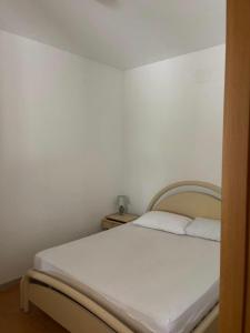 A bed or beds in a room at Villa Margherita