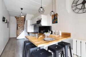 Η κουζίνα ή μικρή κουζίνα στο GuestReady - Le Duplex des pentes